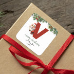 Kids Monogram Christmas Square Sticker<br><div class="desc">Give the gift of personalised charm this Christmas! Our monogram stickers,  featuring Santa hiding behind the letter V,  are a unique and thoughtful way to show your love. Customise with a name,  year and a heartfelt greeting. Make your Christmas gifts stand out!</div>