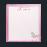 Kids Rainbow Unicorn Notepad<br><div class="desc">This super cute notepad featuring a rainbow unicorn and a pink fairy dust background is sure to brighten up your little lady’s desk! Design by The Spotted Olive. © 2021-Present | The Spotted Olive™ | All Rights Reserved.</div>