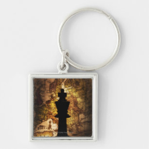 King chess piece on old world map key ring