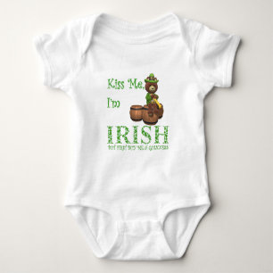 Kiss Me I'm Irish, but First Buy Me A Guinness Baby Bodysuit