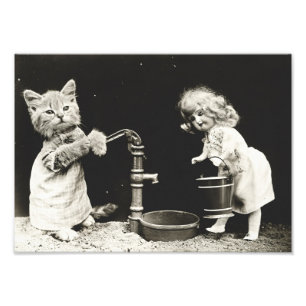 Kitten & Doll at Water Well Photo Print
