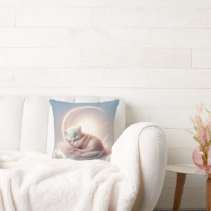 Kitten Sleeping On a Crescent Moon Cushion