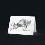 Kitty eyes a Green & Gold Ornament Holiday Card<br><div class="desc">Grey kitten eyes the green and gold ornament as if deciding to attack or not. Sumi-e in colour by artist Ellen Miffitt ,  Nine Lives Studio.</div>