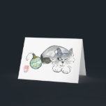 Kitty eyes a Green & Gold Ornament Holiday Card<br><div class="desc">Grey kitten eyes the green and gold ornament as if deciding to attack or not. Sumi-e in colour by artist Ellen Miffitt ,  Nine Lives Studio.</div>