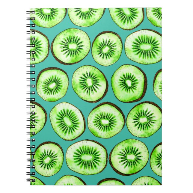 Kiwi slices on turquoise notebook (Front)