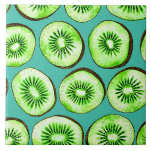 Kiwi slices on turquoise tile