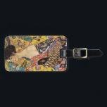 Klimt Lady with Fan Fine Art Luggage Tag<br><div class="desc">Enjoy this reproduction of the masterpiece Lady with Fan by Gustav Klimt. Completed in 1918, the oil painting depicts a stunning beauty draped in a sensual kimono and holding a fan. Artful Life painstakingly digitally restores these works of art to correct for aging colour and vibrancy, while maintaining the lovely...</div>