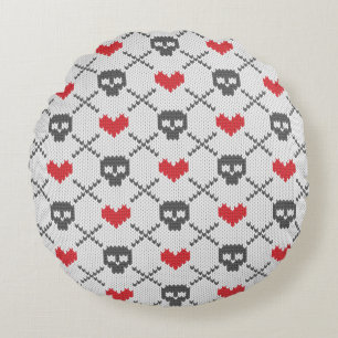 Knitted pattern with skulls round cushion