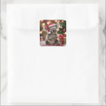 "Koala Kris Kringle: Christmas Down Under" Square Sticker<br><div class="desc">This image brings a festive Australian twist,  with the koala in a Santa hat amidst Christmas presents and a soft bokeh glow.</div>