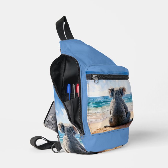 Koala looking at the ocean sling bag (Open)