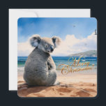 Koala on a sandy beach Merry Christmas Holiday Card<br><div class="desc">Iconic Australian Koala soaking up the sun and sea on a sandy beach with a clear blue sky Merry Christmas greeting on front Merry Christmas and Happy New Year on back This furry koala is a native of Australia they are easily recognizable by their stout, tailless body and large head...</div>
