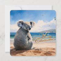 Koala on a sandy beach Merry Christmas