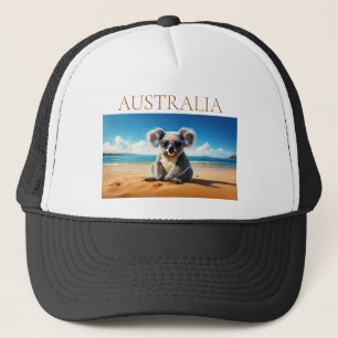 Koala on a sandy beach  trucker hat