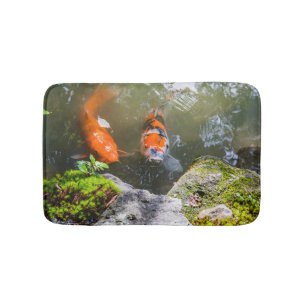 Koi fish in a pond bath mat