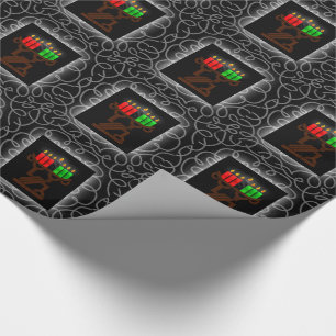 Kwanzaa Lit Kinara Candles with Black and Silver Wrapping Paper
