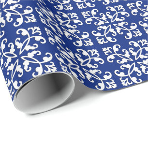 Lacy cutwork - white over lapis blue wrapping paper
