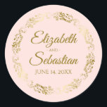 Lacy Gold Filigree Elegant Blush Pink Wedding Classic Round Sticker<br><div class="desc">These beautiful wedding stickers are feature gold text on a blush pink background with a gold faux foil floral border. The text is fully customisable and contains the wedding couple's names and wedding date. Great as favour tags or envelope seals!</div>