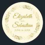 Lacy Gold Filigree Elegant Cream Wedding Favour Classic Round Sticker<br><div class="desc">These beautiful stickers are feature gold text on a cream or ivory background with a gold faux foil floral border. The text is fully customisable and contains the wedding couple's names and wedding date. Great as favour tags!</div>