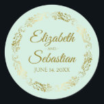 Lacy Gold Filigree Elegant Neo Mint Green Wedding Classic Round Sticker<br><div class="desc">These beautiful wedding stickers are feature gold text on a light neo mint green background with a gold faux foil floral border. The text is fully customisable and contains the wedding couple's names and wedding date. Great as favour tags or envelope seals!</div>