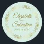 Lacy Gold Filigree Elegant Neo Mint Green Wedding Classic Round Sticker<br><div class="desc">These beautiful wedding stickers are feature gold text on a light neo mint green background with a gold faux foil floral border. The text is fully customisable and contains the wedding couple's names and wedding date. Great as favour tags or envelope seals!</div>