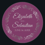 Lacy Silver Filigree Elegant Cassis Purple Wedding Classic Round Sticker<br><div class="desc">These elegant wedding stickers feature fancy pale grey script text on a cassis purple,  magenta,  or berry coloured background with a lacy silver faux foil floral border. The text is fully customisable and contains the wedding couple's names and wedding date. Great as favour tags or envelope seals!</div>