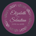 Lacy Silver Filigree Elegant Cassis Purple Wedding Classic Round Sticker<br><div class="desc">These elegant wedding stickers feature fancy pale grey script text on a cassis purple,  magenta,  or berry coloured background with a lacy silver faux foil floral border. The text is fully customisable and contains the wedding couple's names and wedding date. Great as favour tags or envelope seals!</div>
