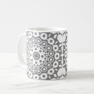 Lacy white squares on a light gray background coffee mug