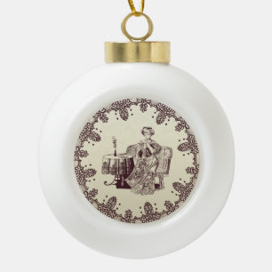 Lady drinks tea ceramic ball christmas ornament