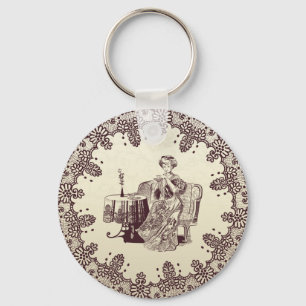 Lady drinks tea  key ring