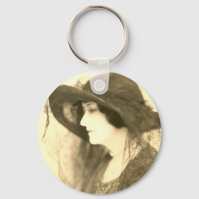 lady in black hat keychain (Front)
