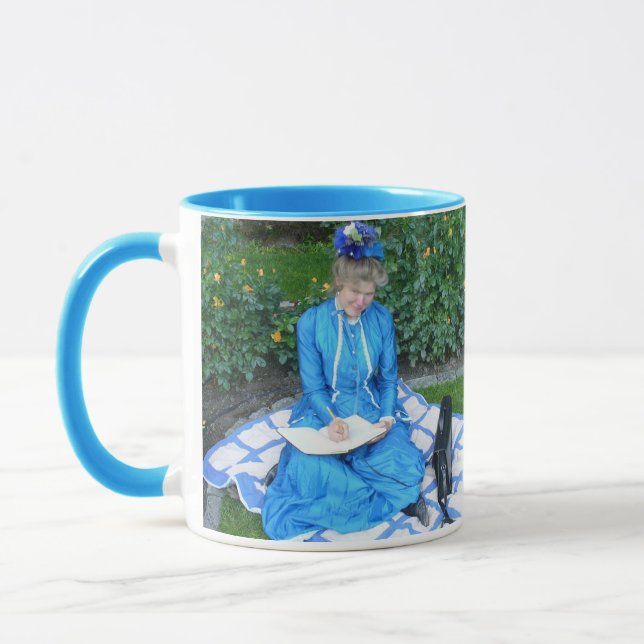 Lady in garden writing book mug (Left)