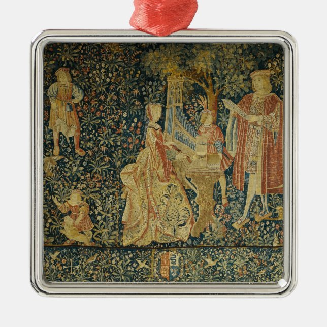 Lady playing the portative organ from metal tree decoration (Front)