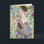 Lady with A Fan, Gustav Klimt Card<br><div class="desc">Gustav Klimt (July 14, 1862 – February 6, 1918) was an Austrian symbolist painter and one of the most prominent members of the Vienna Secession movement. Klimt is noted for his paintings, murals, sketches, and other objets d'art. In addition to his figurative works, which include allegories and portraits, he painted...</div>