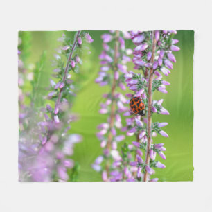 Ladybird on purple flowers  fleece blanket