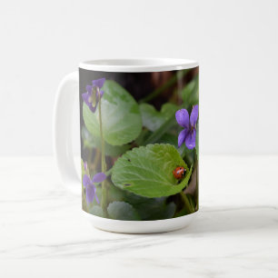 Ladybug on Sweet Violet Flowers Coffee Mug