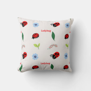 Ladybug pattern on grey cushion