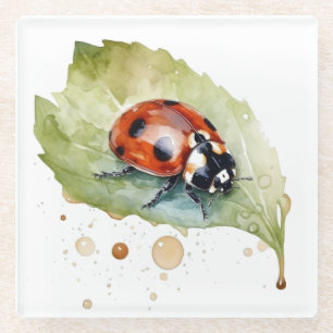 Ladybug sitting on a leaf in vibrant watercolor glass coaster