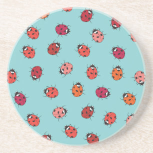 Ladybugs, blue background, charming seamless patte coaster