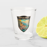 Lago di Garda Italia Travel Art Vintage Shot Glass<br><div class="desc">Lake Garda vector art design. Lake Garda,  in northern Italy,  is known for its crystal clear water. At the south end,  the town of Sirmione is dominated by the Rocca Scaligera,  a fortress with harbour views.</div>