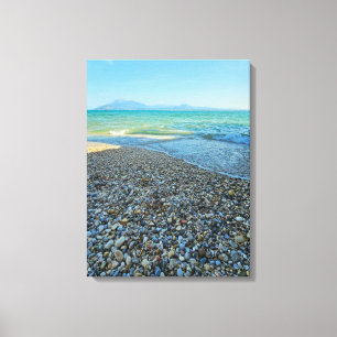 Lake Garda pebbled beach view canvas print