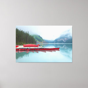 Lake Louise Canoes on Misty Day Canvas Print