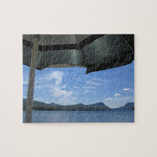 Lake view under umbrella jigsaw puzzle