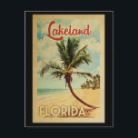 Lakeland Palm Tree Vintage Travel Postcard<br><div class="desc">A uniquely retro mid-century modern Lakeland Florida art print in vintage travel poster style. It features a curved palm tree on sandy beach with ocean under a blue cloudy sky.</div>