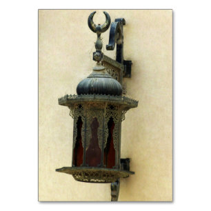 Lamp on the wall of an arabian mosque table number