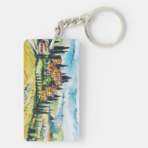 Landscape with town and cypress trees key ring