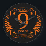Lapis Lazuli wedding anniversary 10 years Large Clock<br><div class="desc">A design to celebrate 10 years of marriage. This design has a Terracotta (Terracotta, the traditional colour for this anniversary) coloured laurel design on a black background. Lapis Lazuliis the traditional gemstone for this occasion. The text reads Ivory 10 years anniversary. A romantic design to celebrate your 10th year of...</div>