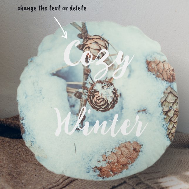 Larch cones on the fresh blue snow round cushion (Creator Uploaded)