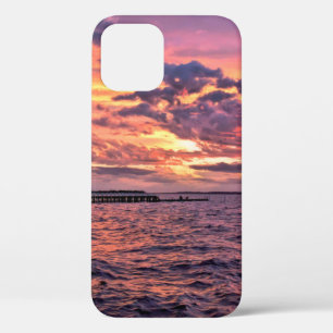 Large colourful sunset over waterbeach,beautiful,c iPhone 12 case