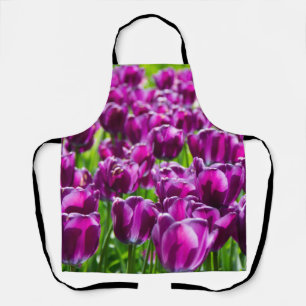 Large field of purple tulips apron