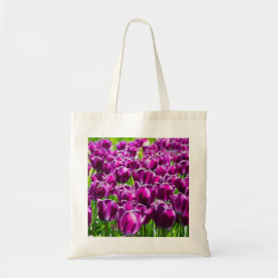 Large field of purple tulips tote bag
